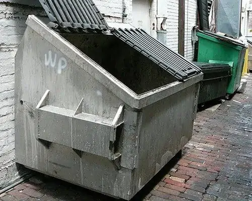 Commercial dumpster pad cleaning