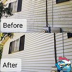 Before and after photo of metal siding cleaning