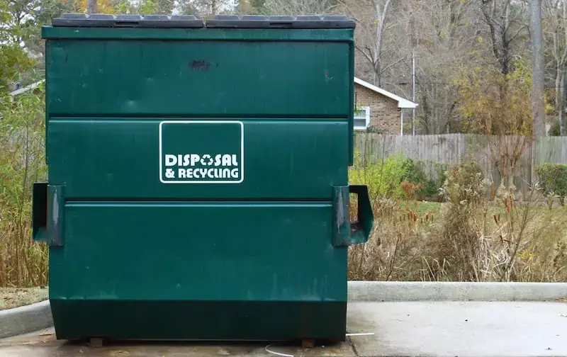 Commercial dumpster pad cleaning