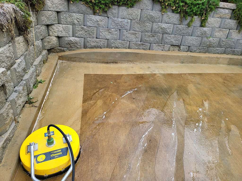 Concrete cleaning with dirty mud.